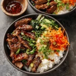 A delicious plate of Korean BBQ Steak Rice Bowls with Spicy Cream Sauce