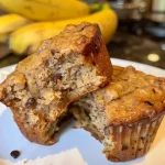 Close-up view of moist gluten-free banana muffins with chocolate chips.