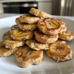 Close-up of fluffy protein pancake bites with banana and chocolate chips.