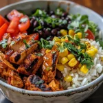 Close-up view of a Chipotle Chicken Bowl with vibrant ingredients.