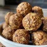 Close-up of No-Bake Peanut Butter Energy Balls on a plate, showcasing their round shape and texture.