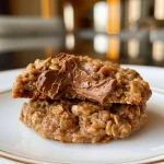 Close-up side view of a healthy oatmeal breakfast cookie with a soft texture.