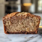 Close-up of moist Protein Banana Bread with a golden crust.
