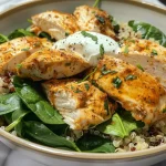 Close-up view of a savory spinach and chicken protein bowl, featuring vibrant greens and tender chicken.