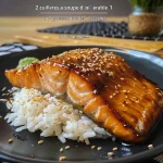 ['Close-up view of a glazed teriyaki salmon fillet on a plate.', 'Side profile of a succulent teriyaki salmon dish garnished with sesame seeds.', 'Juicy teriyaki salmon served with vibrant toppings and a shiny glaze.', 'Delicious piece of teriyaki salmon with a rich sauce and sesame on a white plate.']